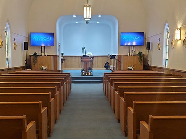 Sanctuary aisle and pews facing the pulpit